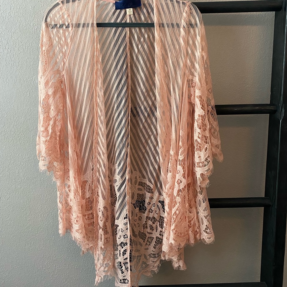 Peach colored lace coverup/cardigan